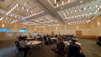 Attendees listening to the morning session of lightning talks. 