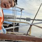Delbert making a fun face in front of water.